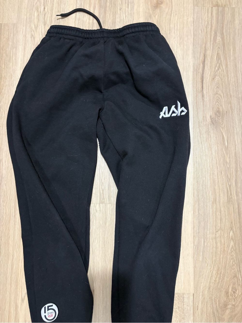 Black Sweatpants with White Logo - 15 Years Patch